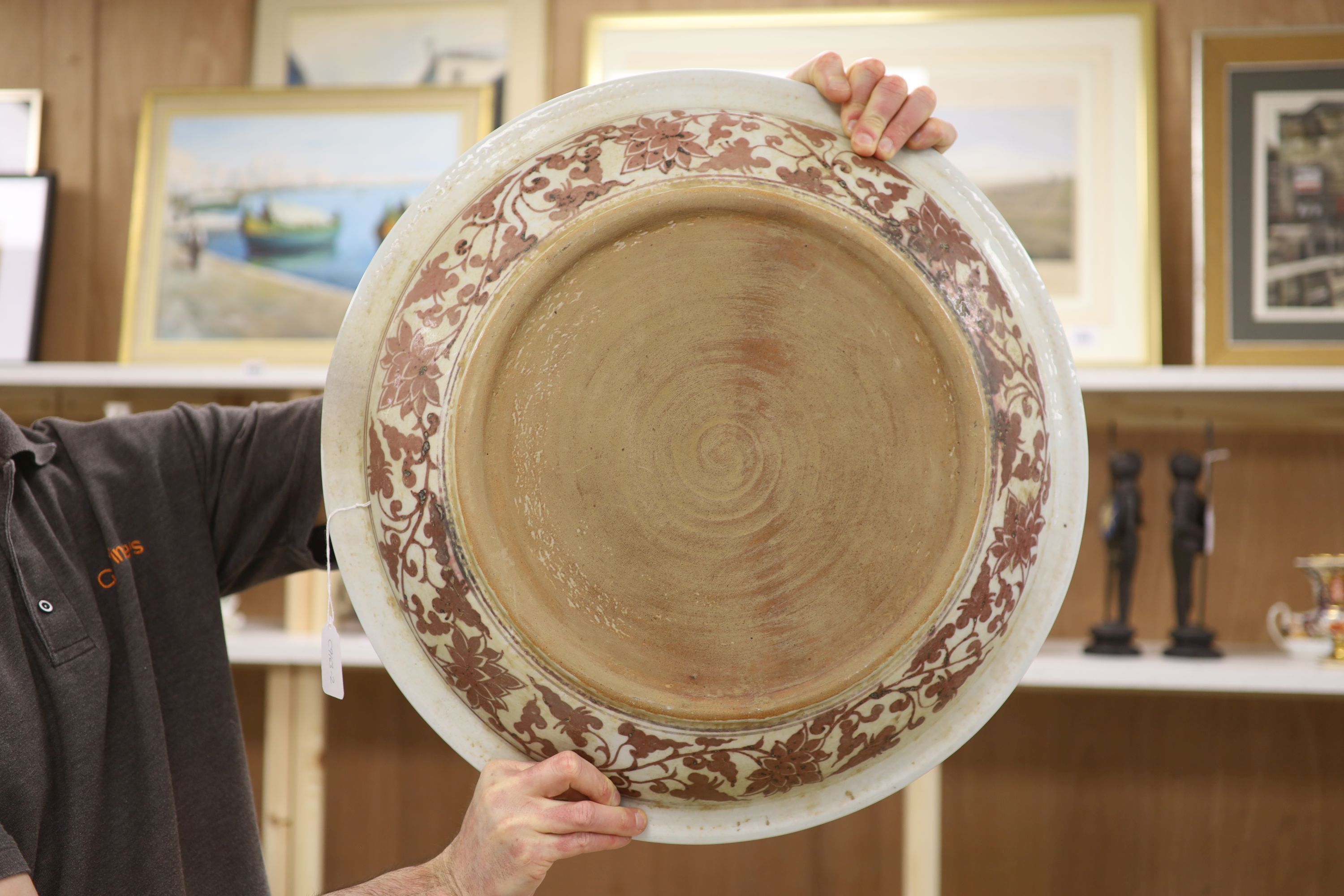 A large Chinese underglaze copper red charger, diameter 53cm